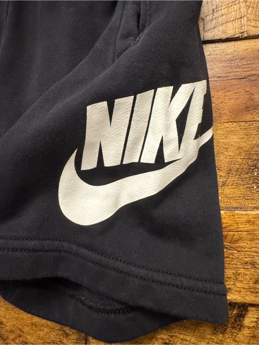 Nike Black Kids Athletic Shorts with White Swoosh